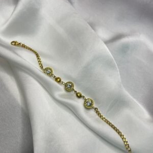 This is a Gold Luxe Orb bracelet. Its premium designer bracelet, that is anti tarnish and long lasting